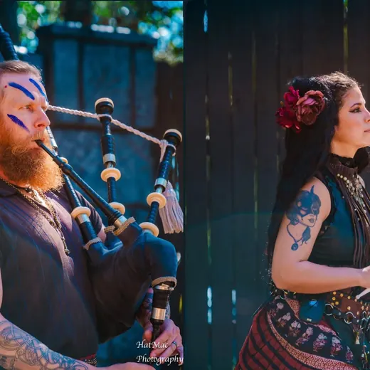 A bagpiper in a kilt and a drummer with a red rose in her hair perform as Damh and Dove